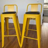 Pair of yellow Tolix high chairs