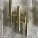 Tubular wall sconces in brass, Italian design from the 1970s, attributed.