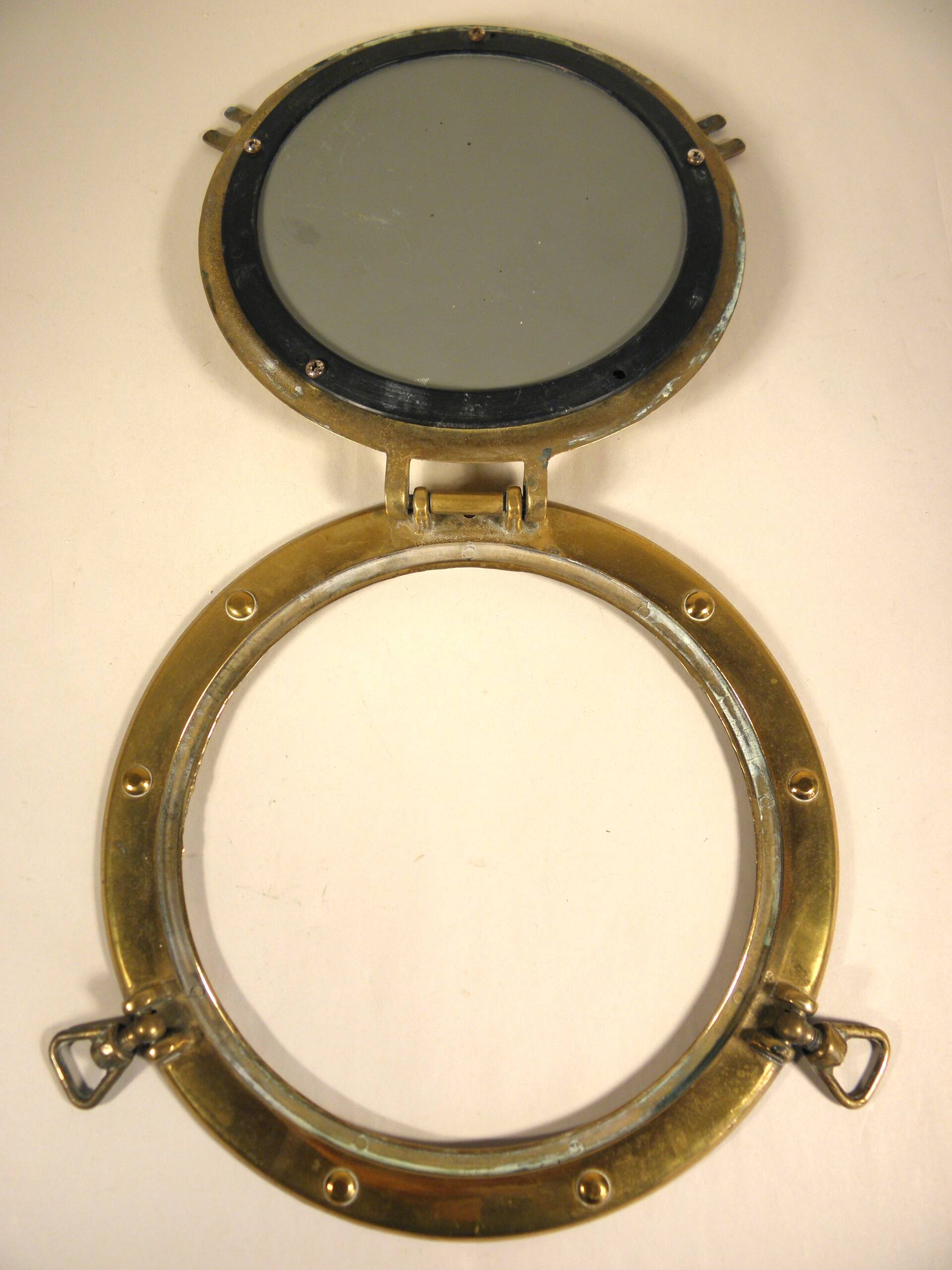 Mirror porthole in brass 25 cm