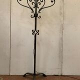Floor lamp has four wrought iron lights