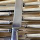 Box of silver metal knives