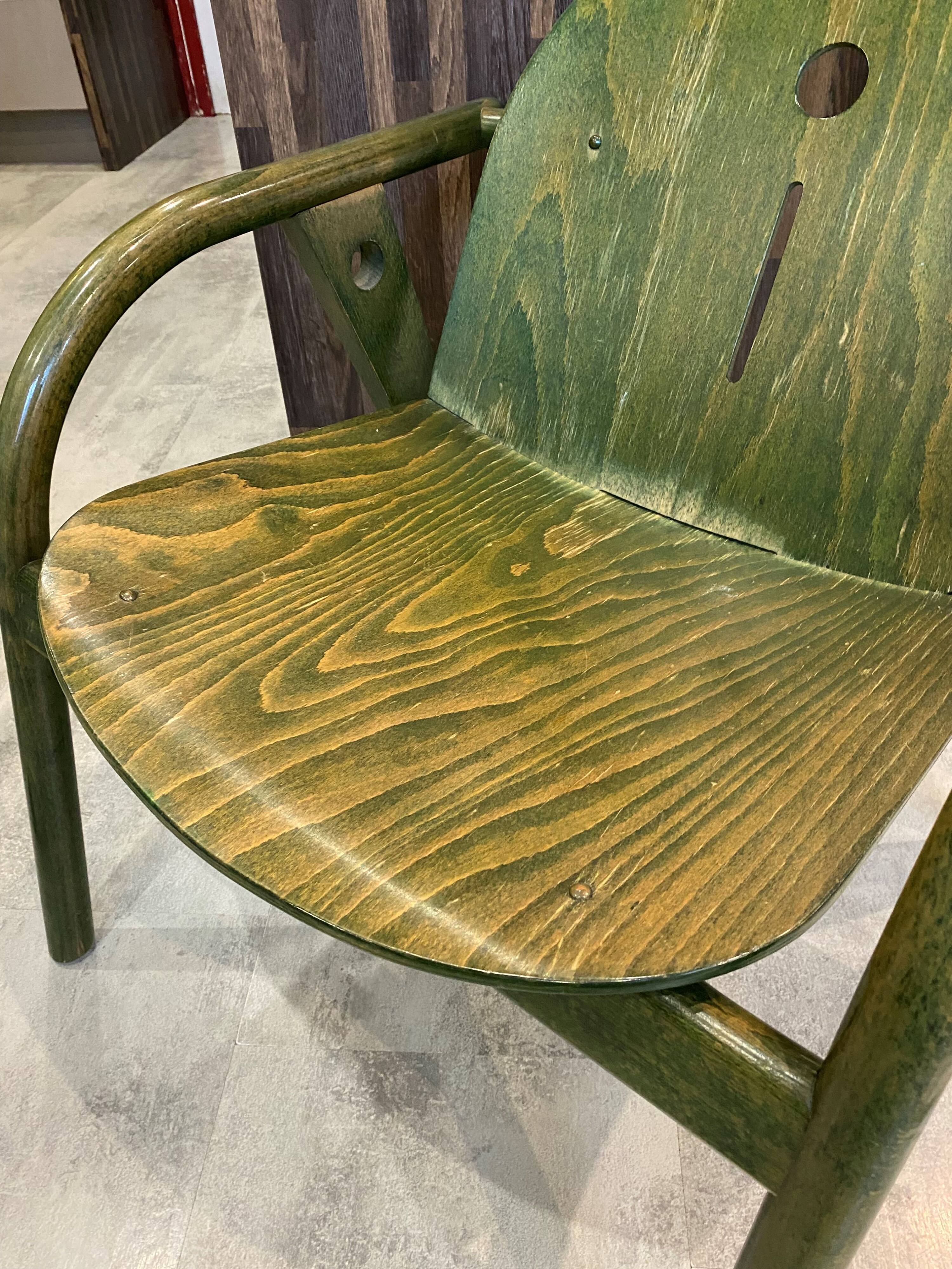 Fauteuil Baumann vert, années 70