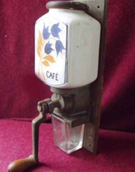 Old wall-mounted coffee grinder