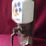 Old wall-mounted coffee grinder