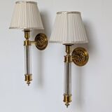 Pair of gilded bronze and plexiglass wall lights