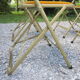 Série de 4 chaises pliantes métal doré et tissus