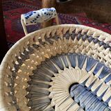 Wicker basket and vintage asymmetrical antique ceramic