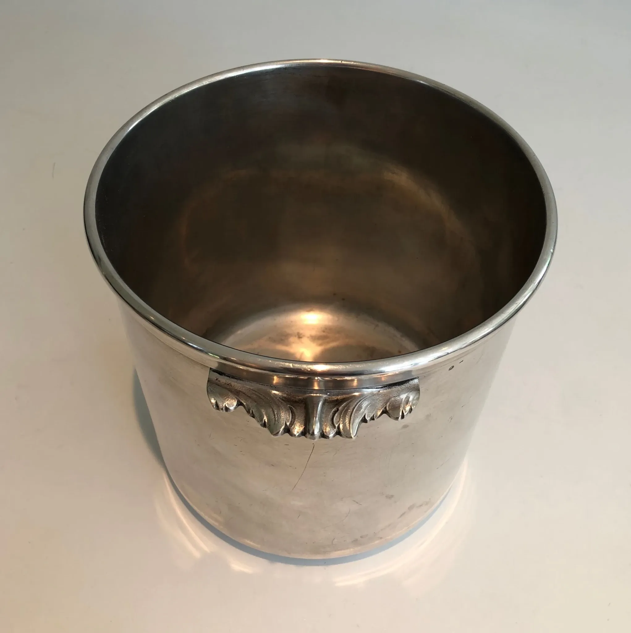 Cylindrical Silver-Plated Champagne Bucket with Small Leaf-Shaped Handles.