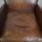 A stately, well-preserved, and comfortable sheepskin armchair