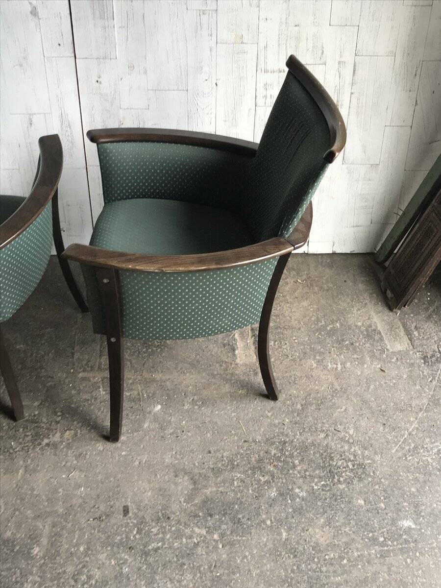 Pair of mid-century armchairs in wood and green fabric, 1960s, vintage style.