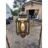 North African lantern suspension in brass and coloured glass.