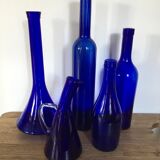 Series of five bottles / jars of cobalt blue apothecary
