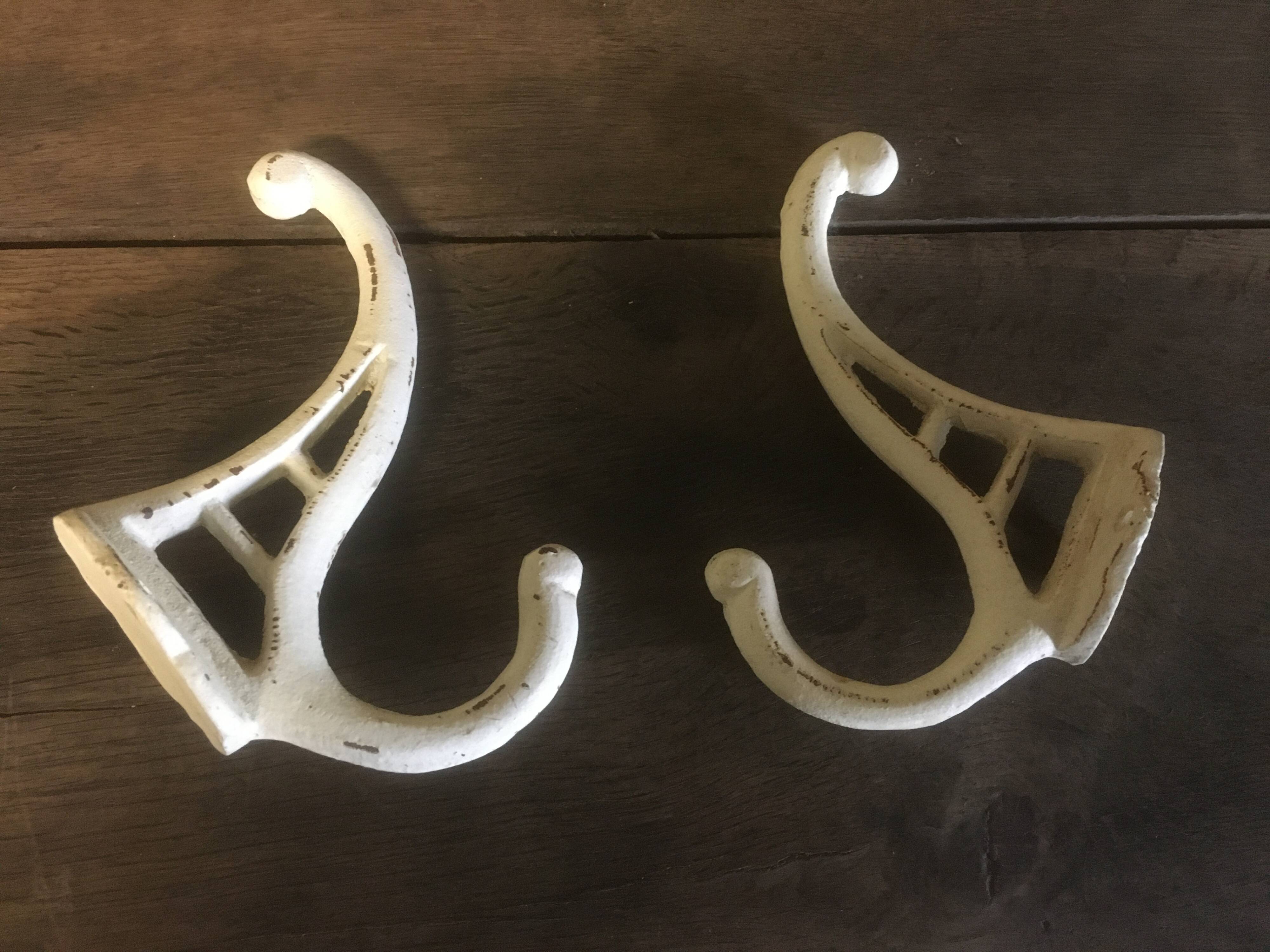White cast iron wall hooks