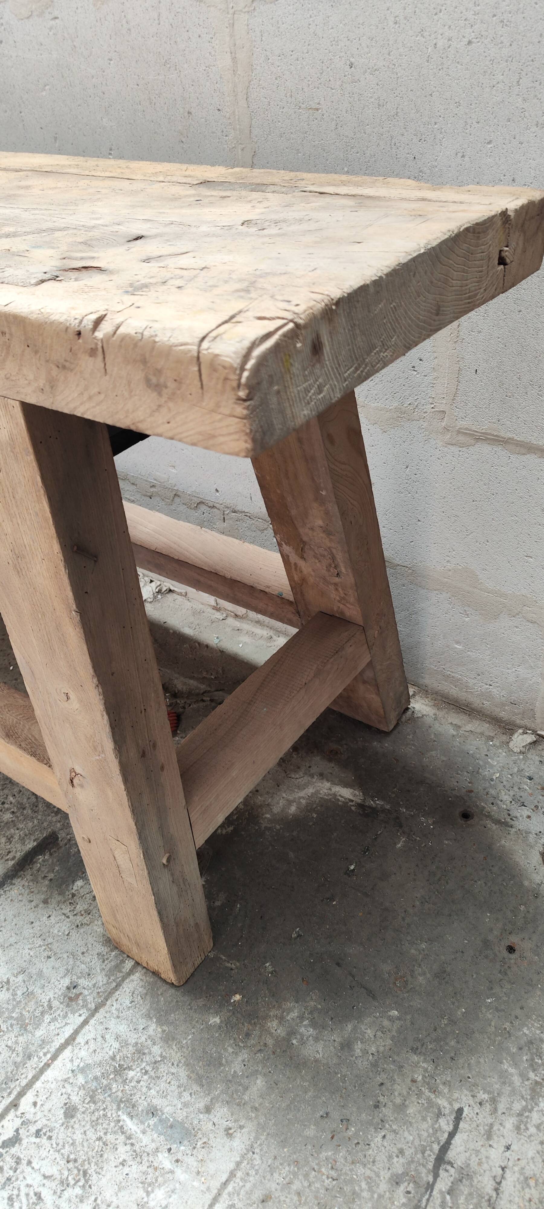 Old carpenter's workbench with eight metal drawers, industrial console