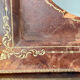 Antique leather framed mirror with gildings 30 cm x  24 cm