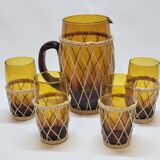 Vintage orangeade service in amber blown glass and wicker