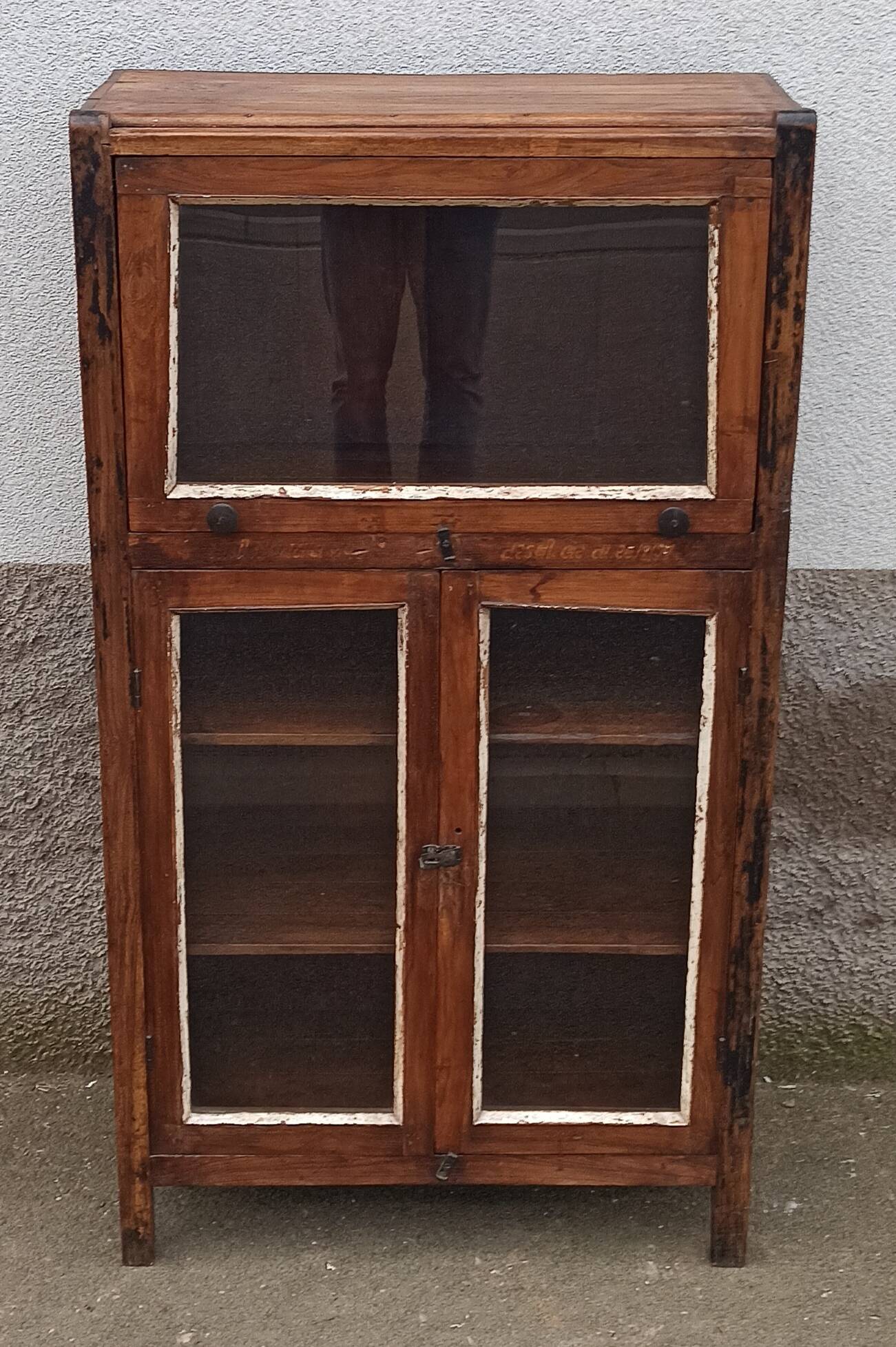Small wooden glass cabinet with retractable door