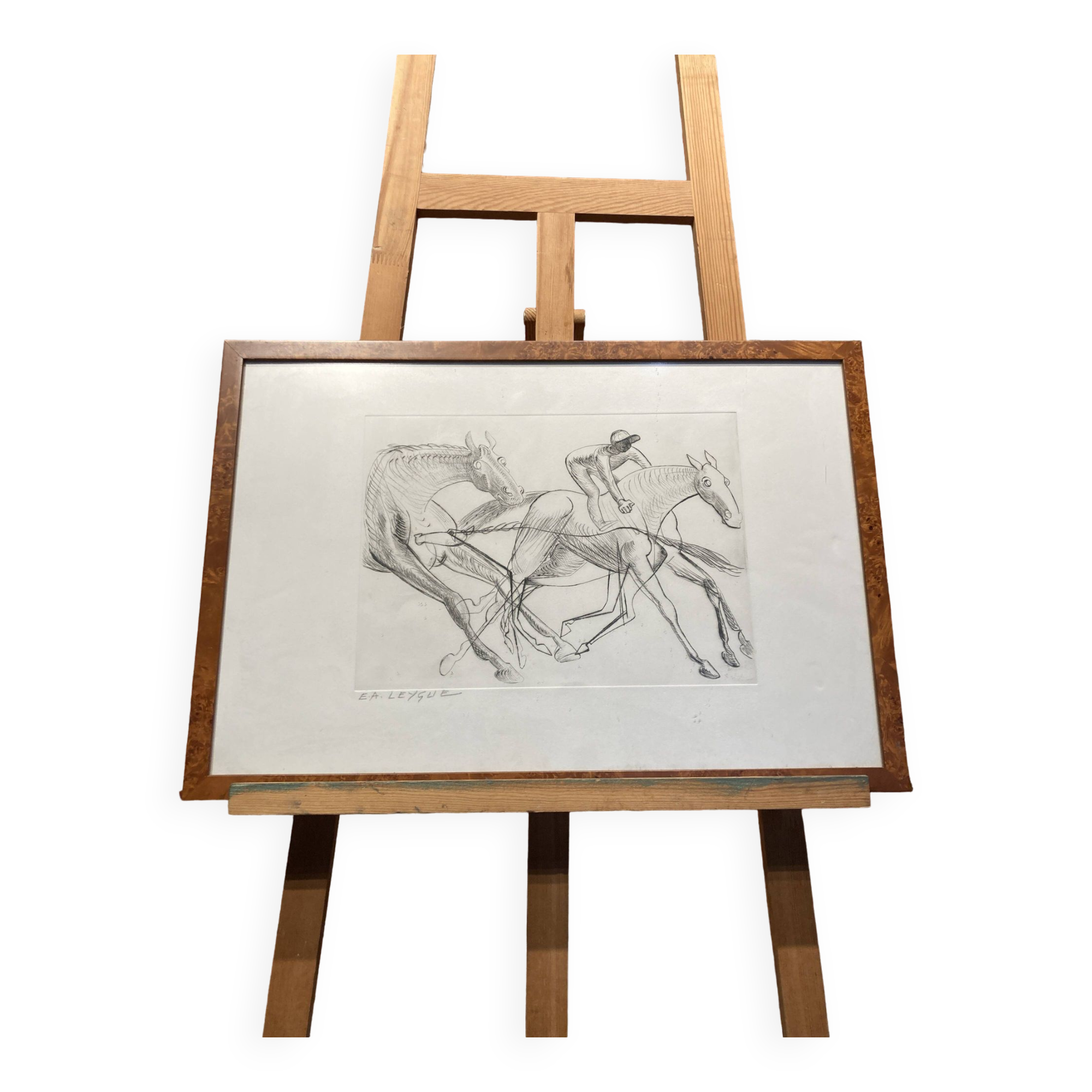 Framed horse drawing.