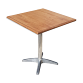 Table bistrot pliable avec plateau en teck et piètement alu