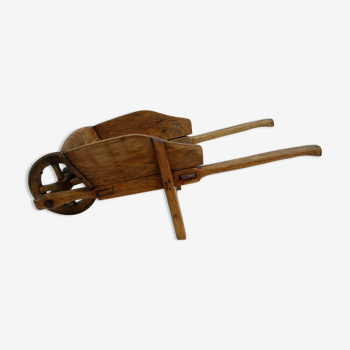 Old wooden wheelbarrow, for children