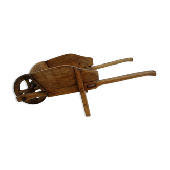 Old wooden wheelbarrow, for children