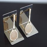 Pair of bookends, tennis racket.