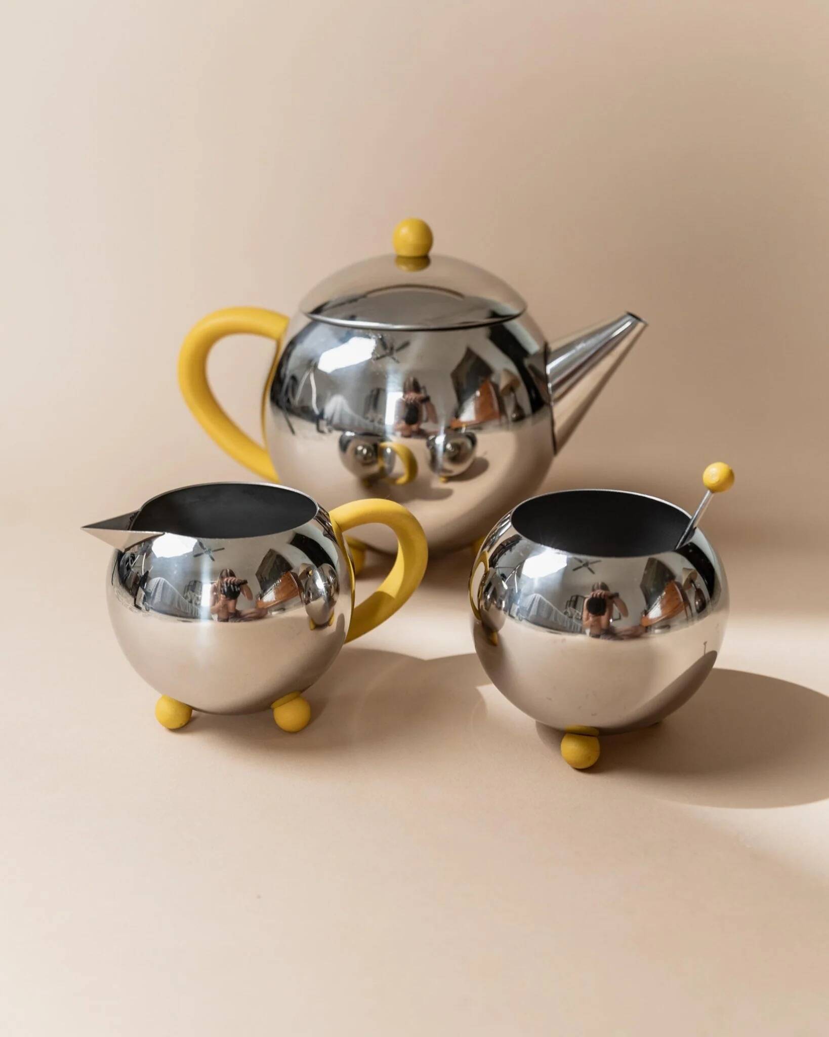 Space Age Vintage 1980s Stainless Steel Tea and Coffee Set with Yellow Accents Teapot Creamer and Sugar Bowl