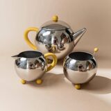 Space Age Vintage 1980s Stainless Steel Tea and Coffee Set with Yellow Accents Teapot Creamer and Sugar Bowl