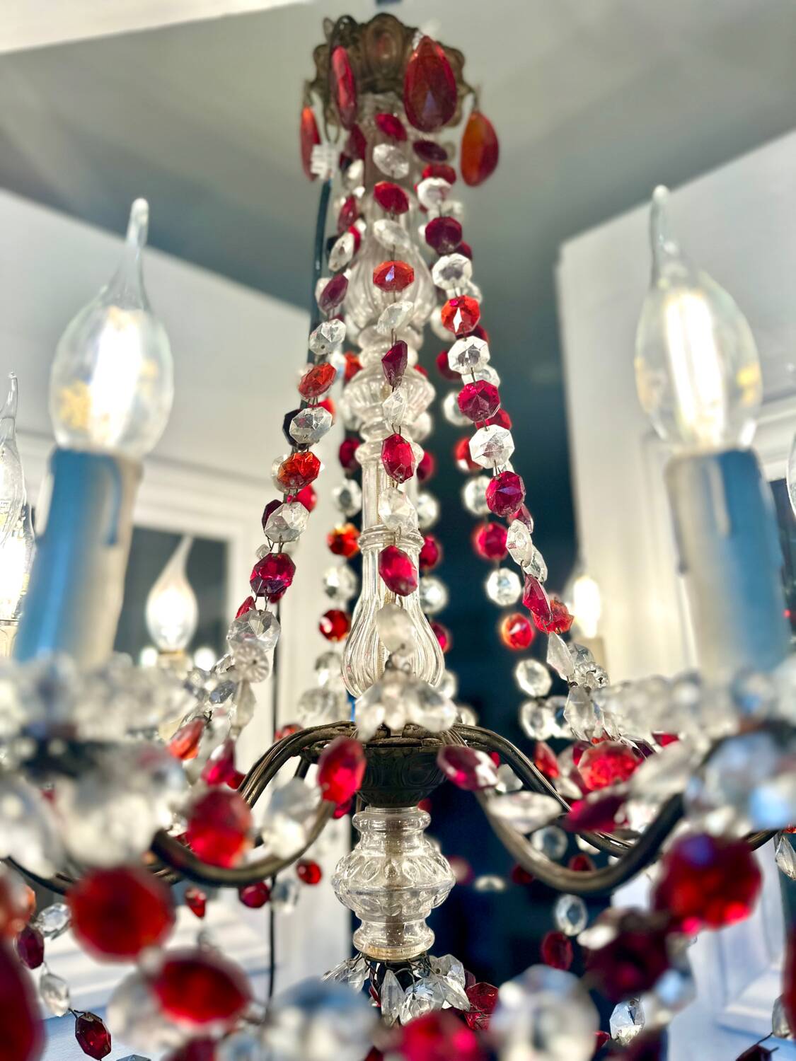 Antique chandelier with red crystal pendants, 9 lights.