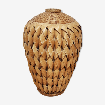 Vase in braided bamboo leaves