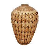 Vase in braided bamboo leaves