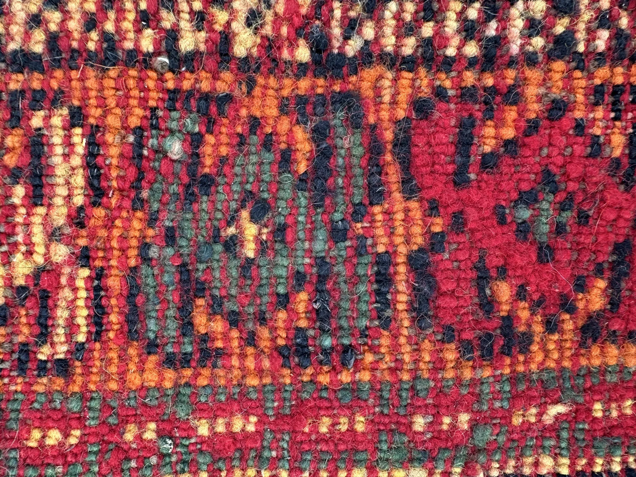 Old Moroccan carpet, made of natural wool and handwoven.