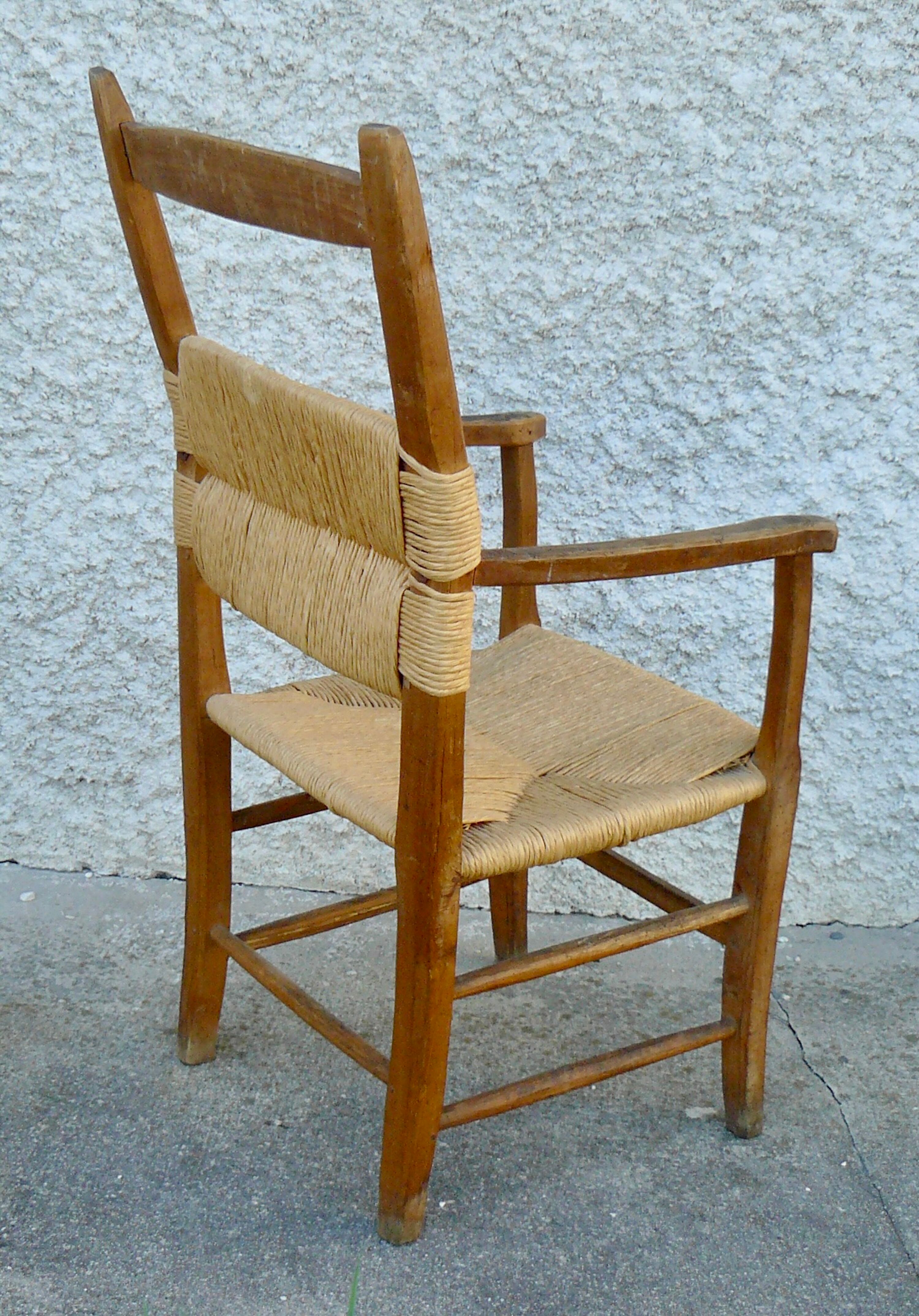Brutalist straw armchair Folk art