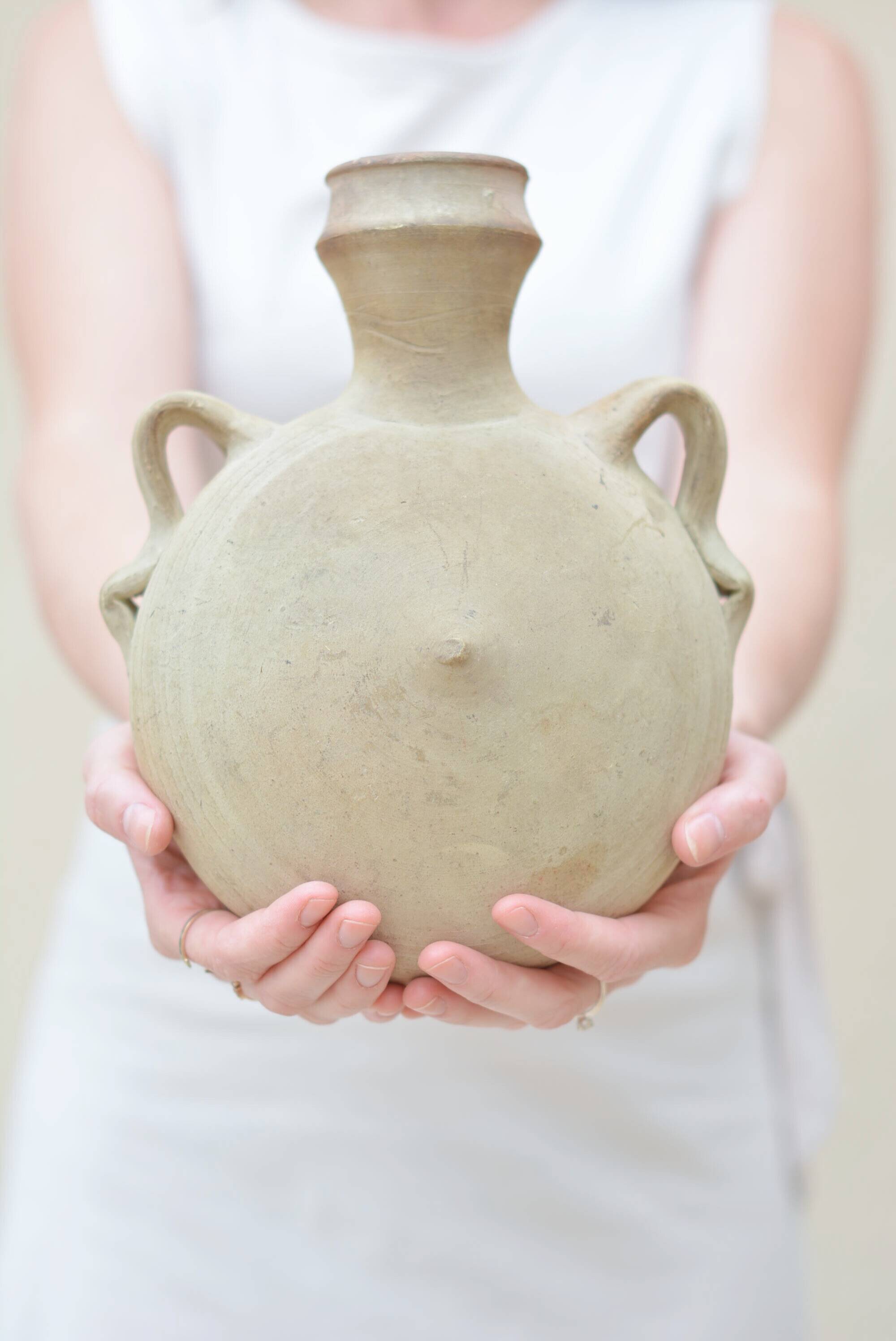 Round terracotta jug