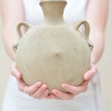Round terracotta jug