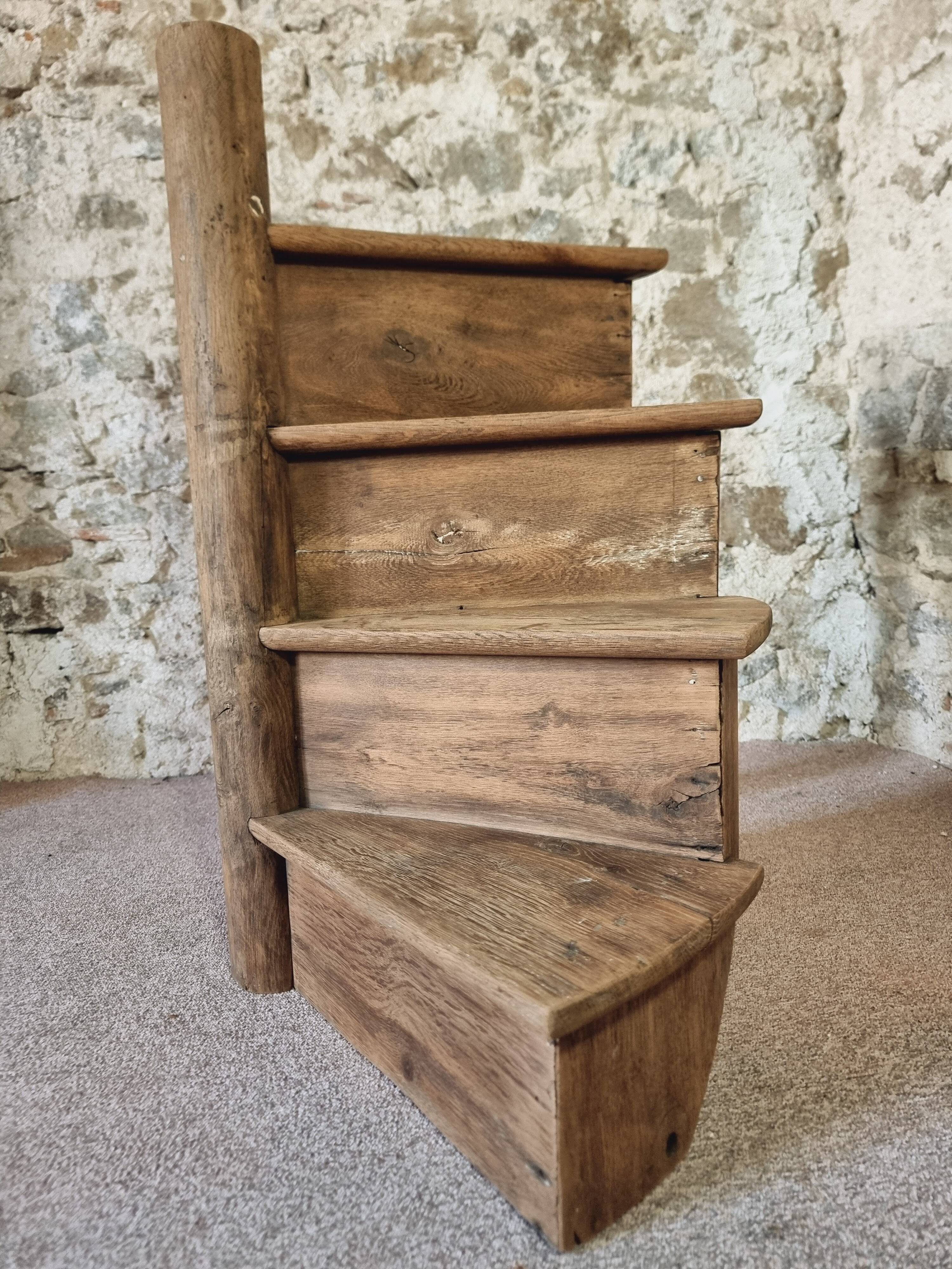 Segment of a spiral staircase in solid oak, early 19th century.
