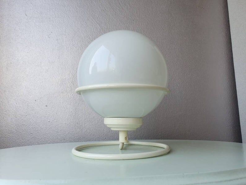 Vintage light bulb lamp on metal support 1980