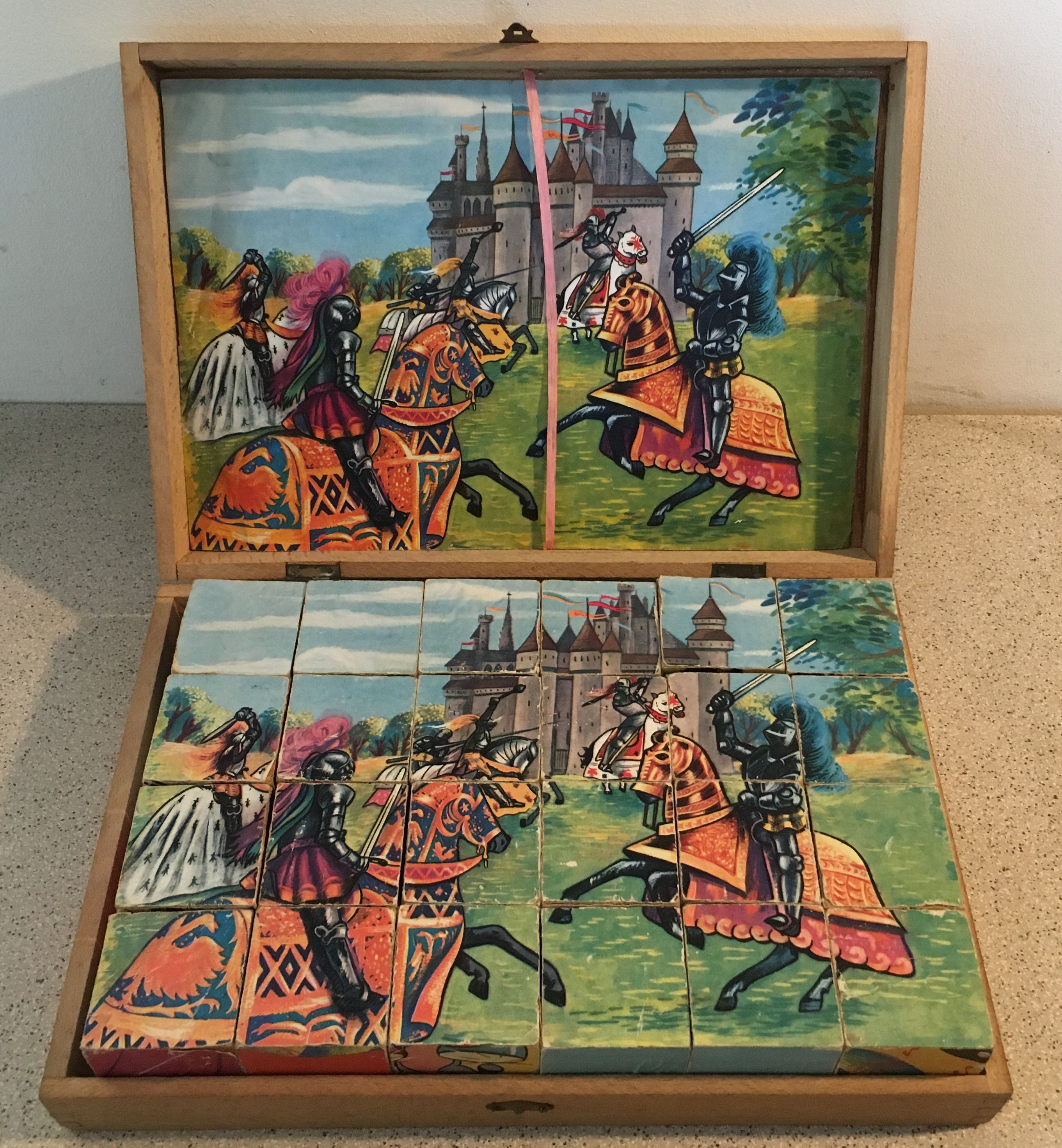 Old game of 24 wooden puzzle cubes from the 1950s