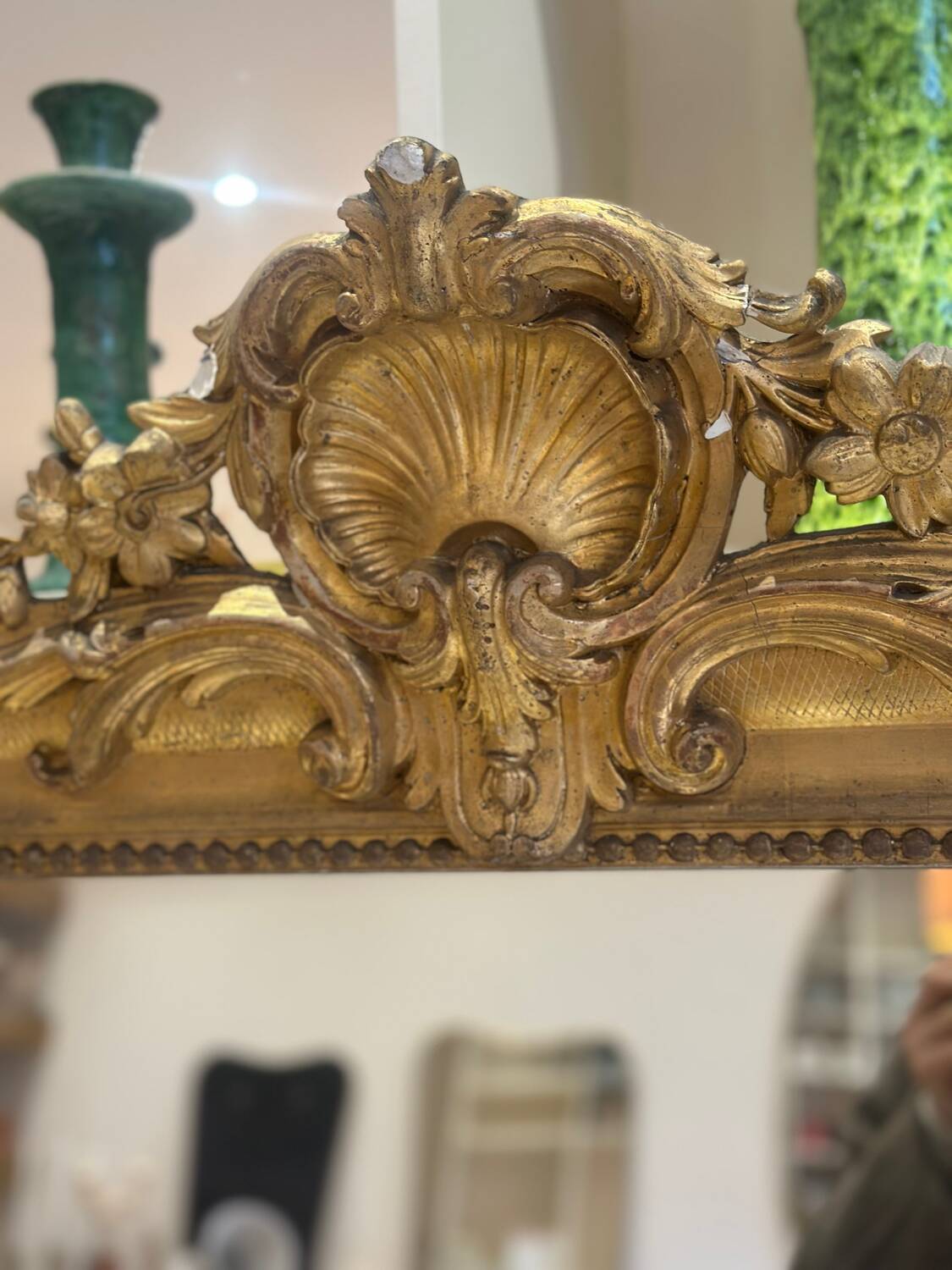 Antique Louis-Philippe mirror carved and gilded with leaf