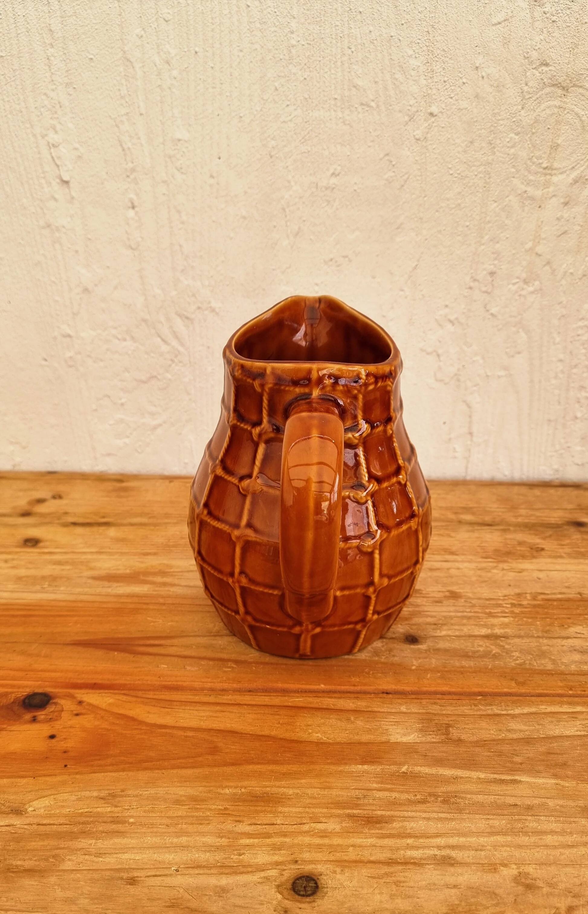 Vintage Saint Clément jug with a caramel checkered design.