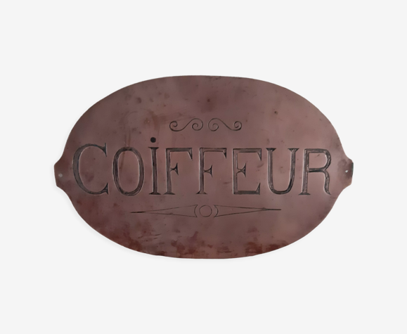 Ancienne plaque en cuivre rouge de coiffeur