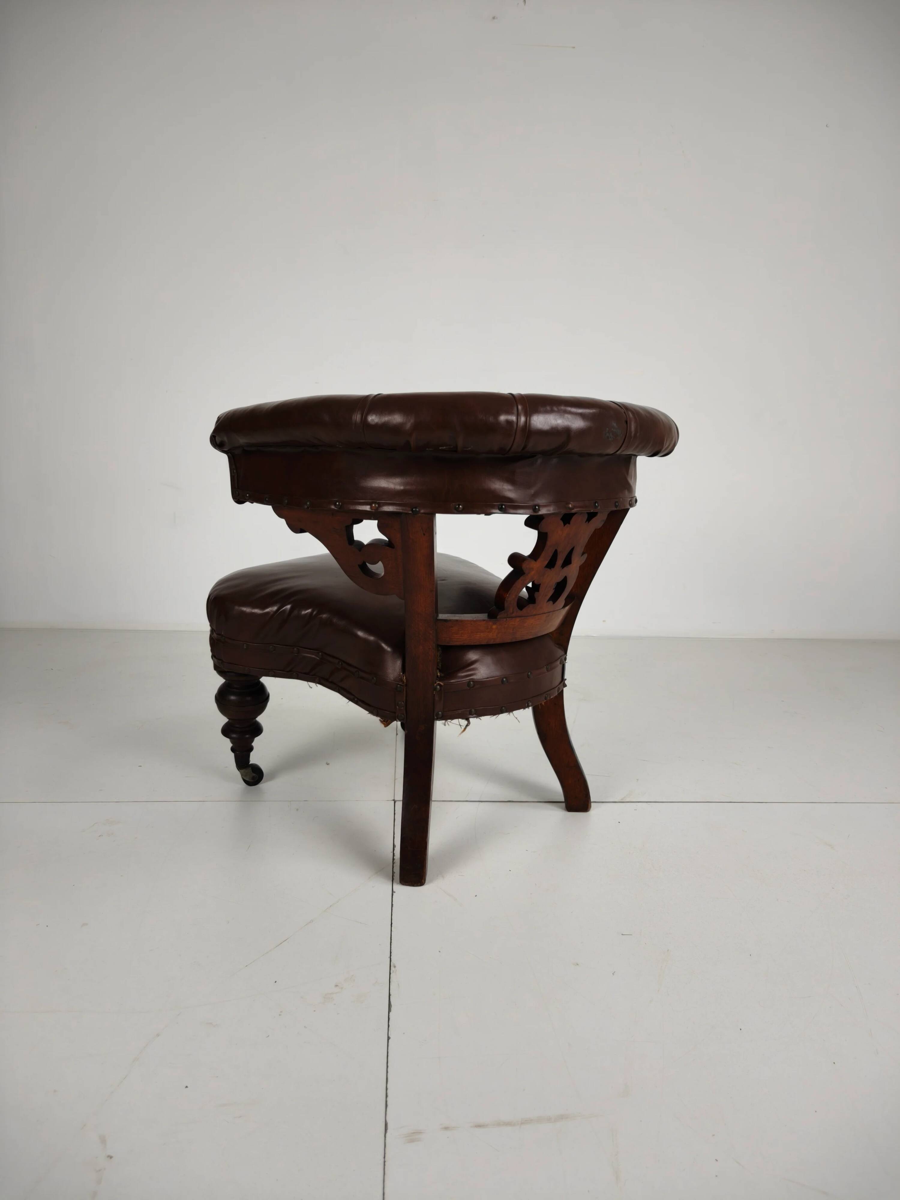 Antique leather armchair by Robson & Son – carved wood & castors, Newcastle