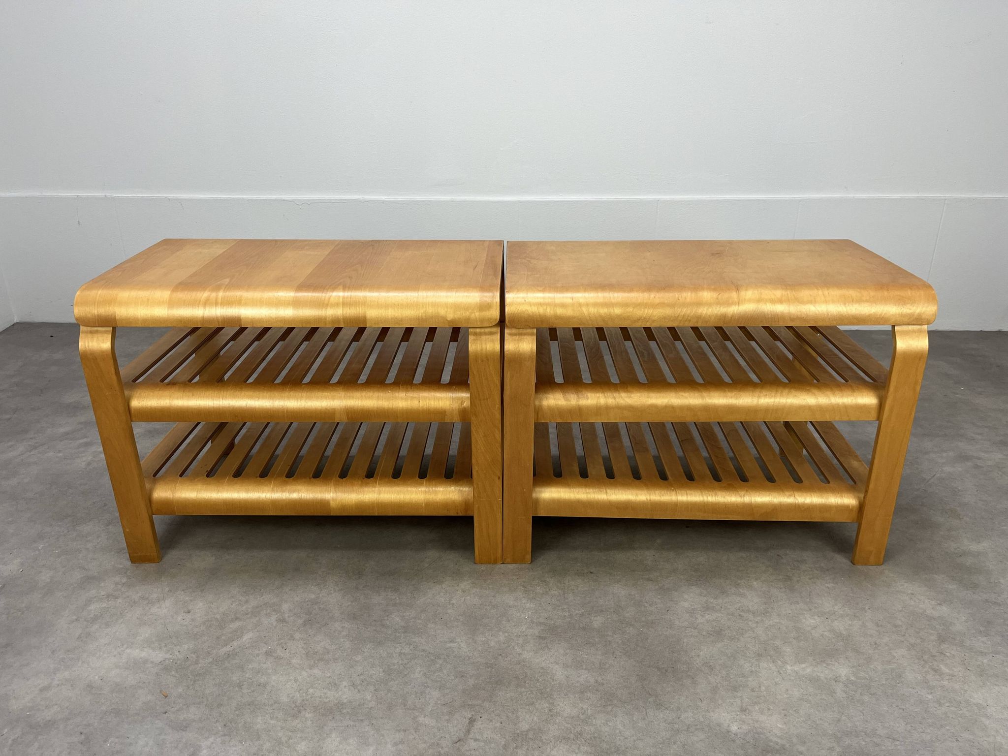 Pair of curved wooden entrance benches 1980