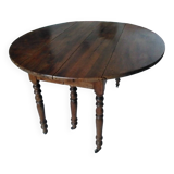 Louis-Philippe round table in solid walnut, extendable