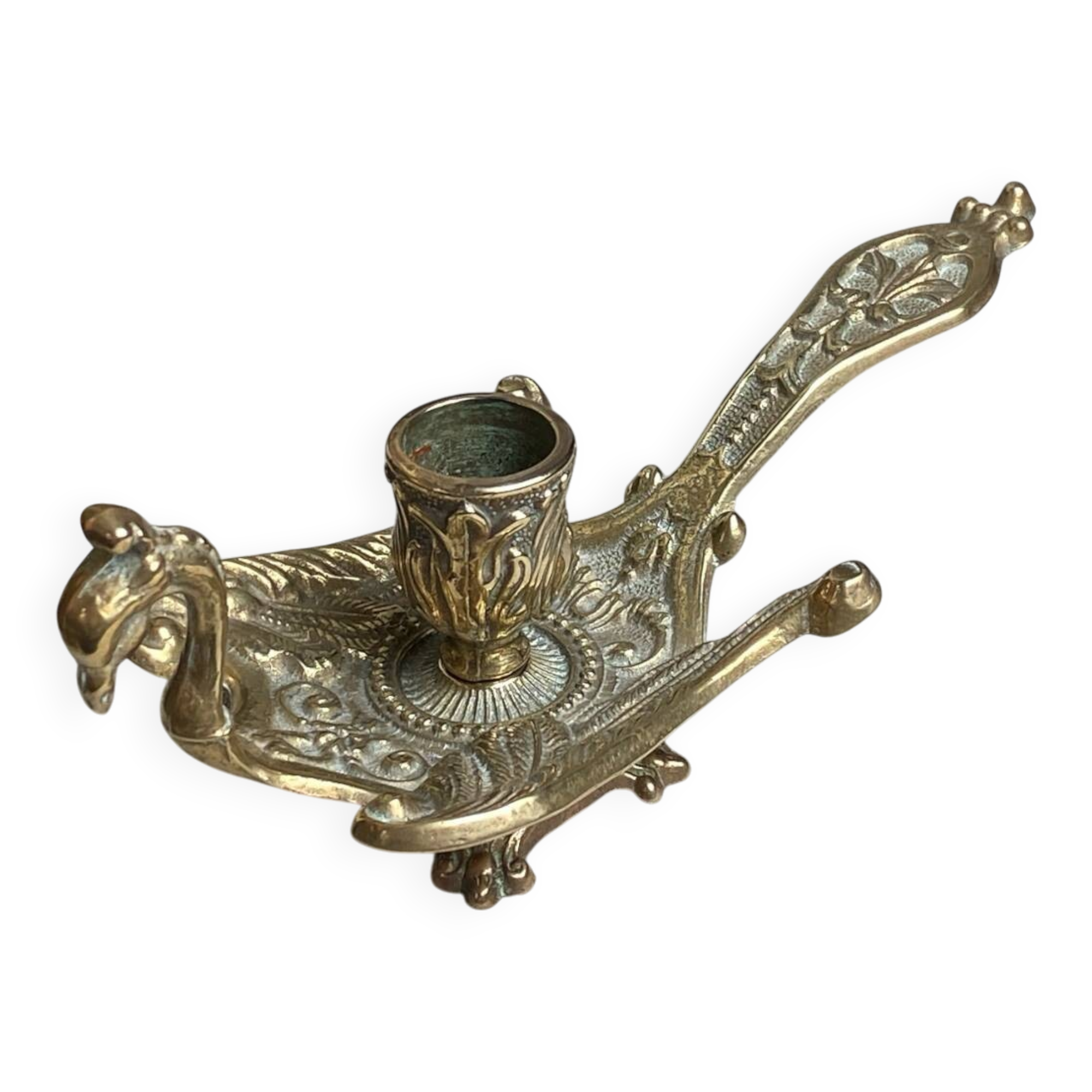 Bronze hand candlestick in the shape of a peacock