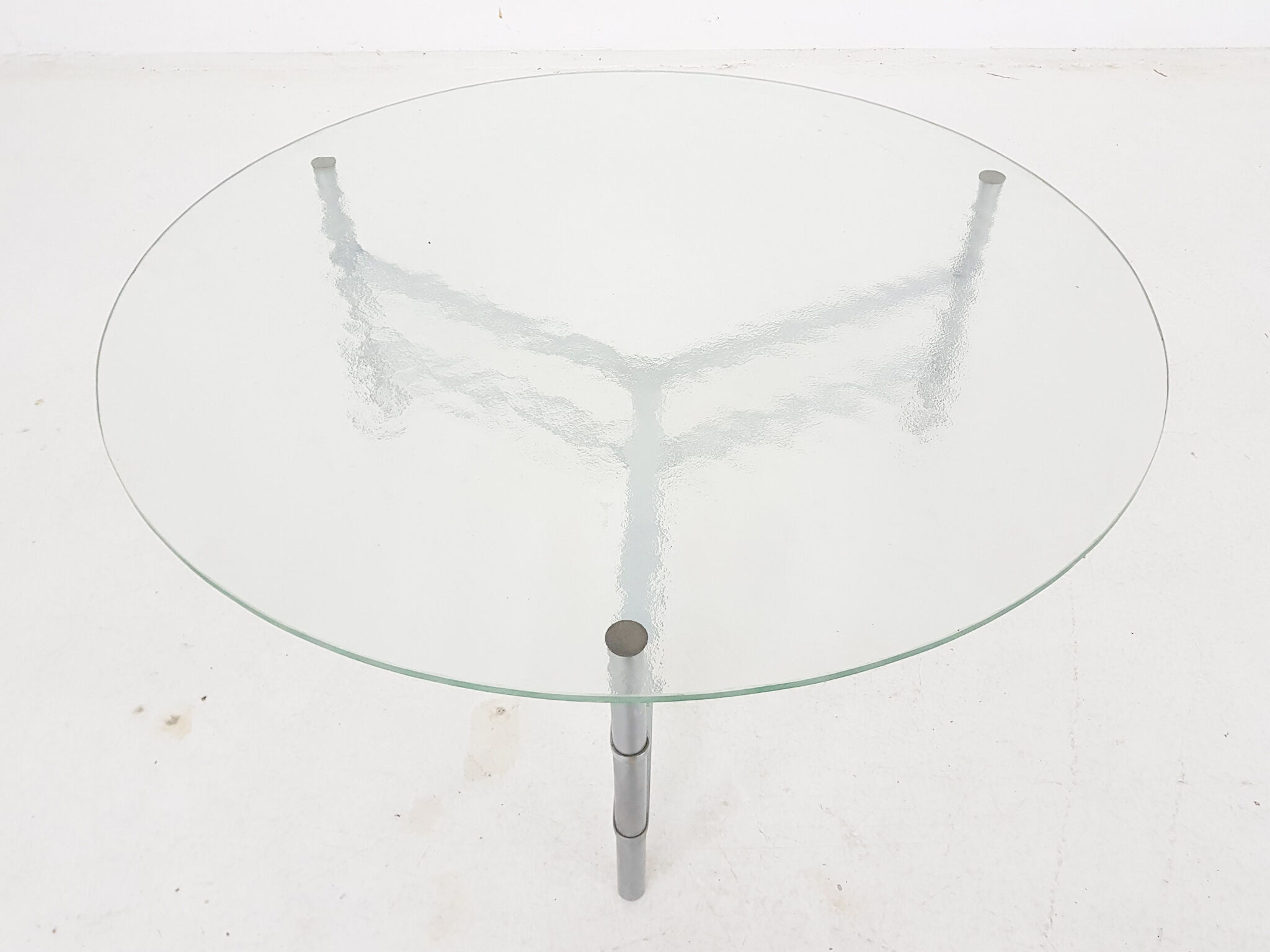 Mid-century round glass and chrome coffee table