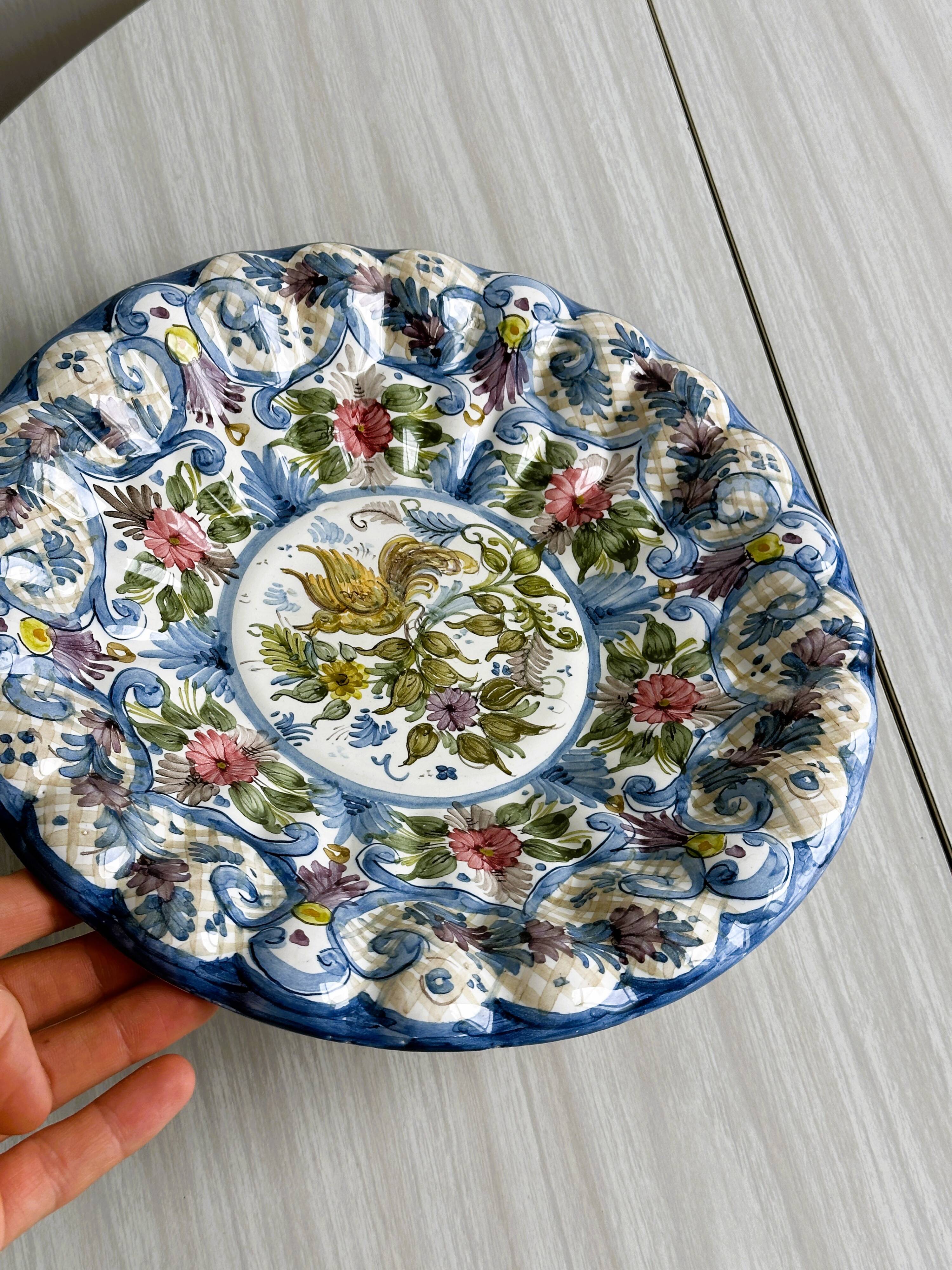 Large decorative dish hand painted with floral and bird motifs