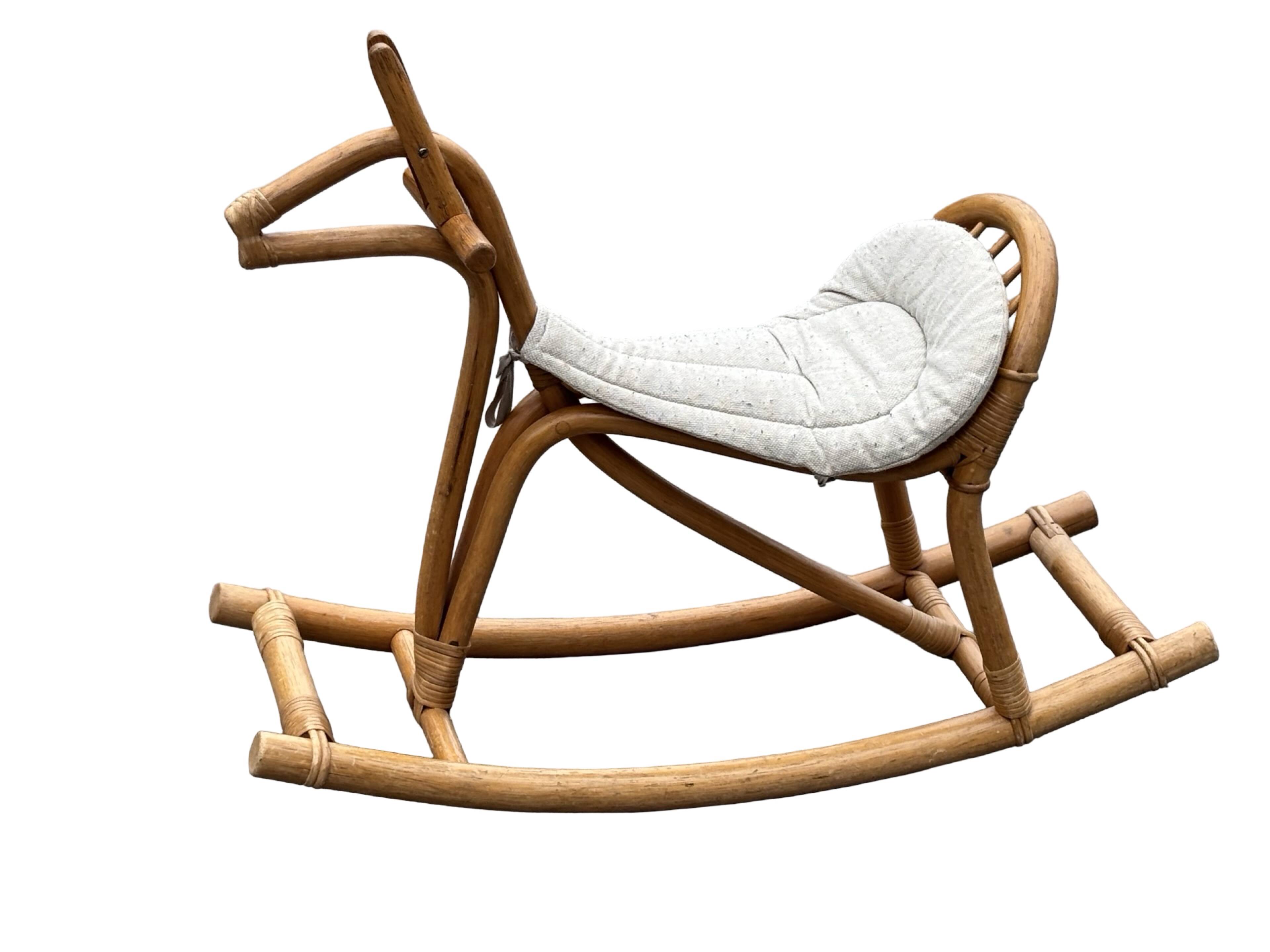 Vintage rattan rocking horse for a 1960s nursery design