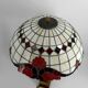 Important Tiffany-style lamp, bronze and stained glass – 20th century