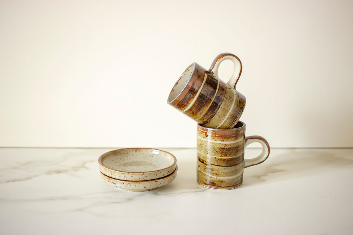 Pair of stoneware cups and sub-cups